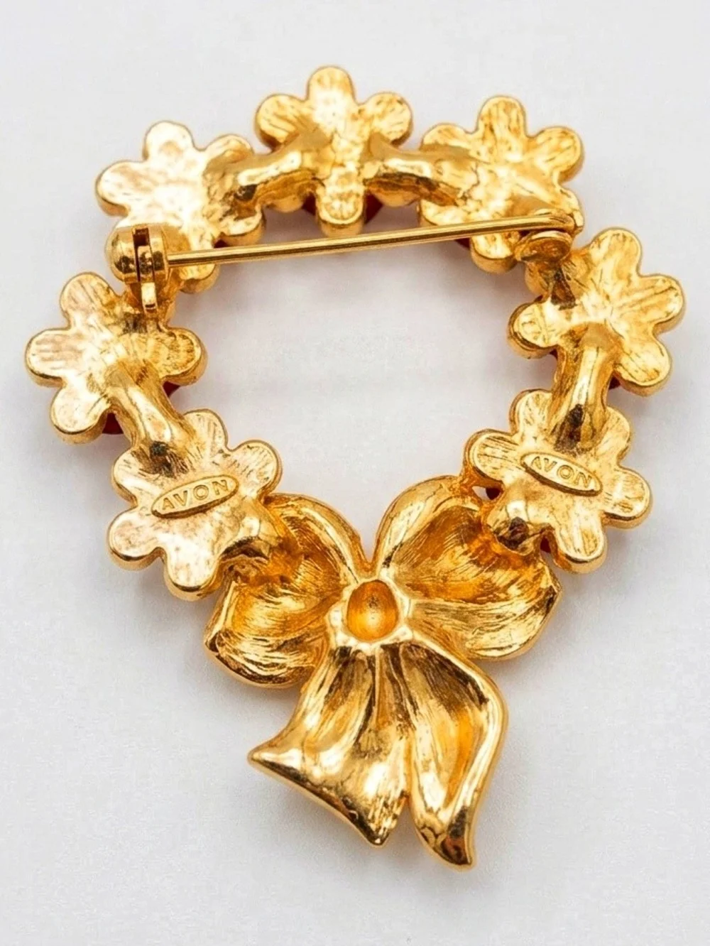 Avon Gold Bow Wreath Brooch with Red Roses and Green Accents